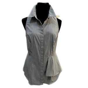 Beautiful sleeveless blouse with asymmetrical detail.